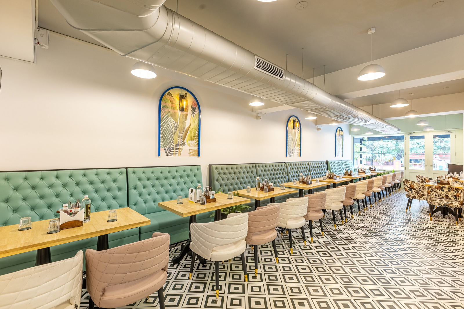 Banquettes and arches in the dining room at BANOFFEE